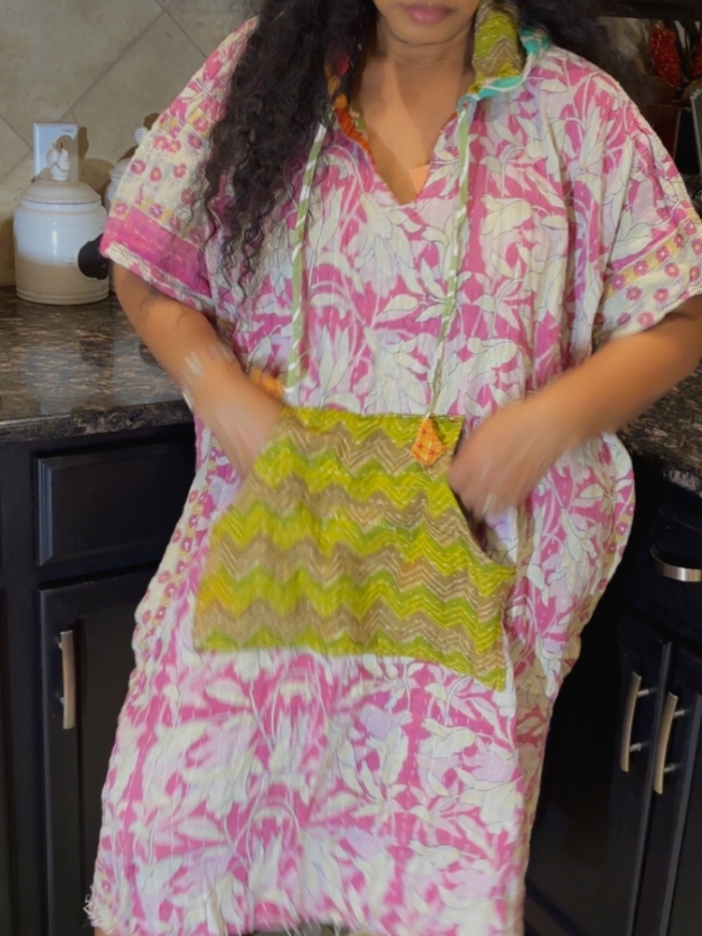 Kantha Relaxed reversible poncho in Pink Floral with Green Accent. Kangaroo pouc